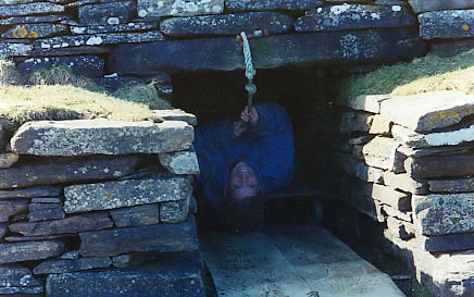 Kate exits the Tomb of Eagles