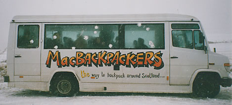 The bus, pelted with snowballs